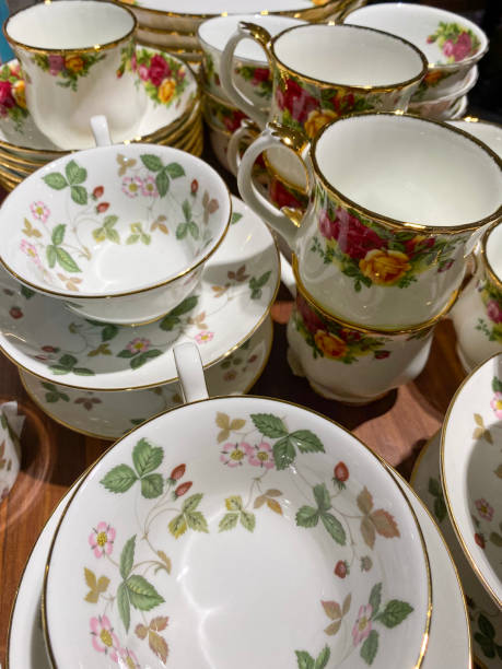 istock ceramic cup set at retail market with flowers design. 1441681481