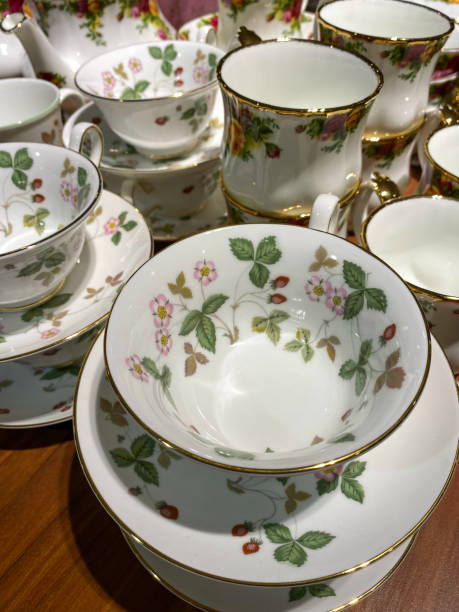 istock ceramic cup set at retail market with flowers design. 1441681482