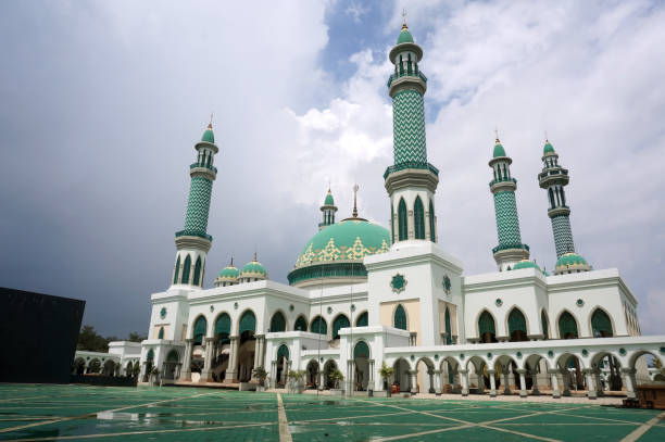 Al Faruq Mosque one of the biggest mosques in East Kalimantan-Indonesia. Rainbow Hill, Sangatta, Kutai Timur, East Kalimantan, Indonesia. 08/01/2014. Al Faruq Mosque one of the biggest mosques in East Kalimantan-Indonesia. karman stock pictures, royalty-free photos & images