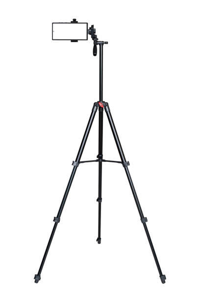 istock Smartphone with blank screen on the tripod camera isolated on white background. 1441685730