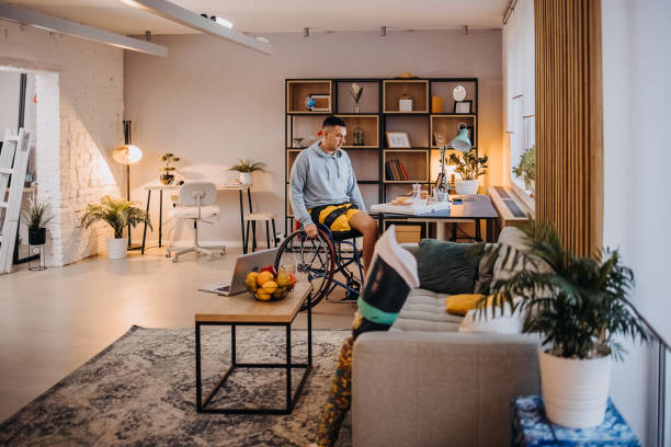 istock Man sits in a wheelchair 1441685941