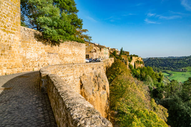 View from of the medieval hill town of Orvieto, Italy Orvieto, Italy - October 28, 2022: View from of the medieval hill town of Orvieto, Umbria, Italy orvieto stock pictures, royalty-free photos & images