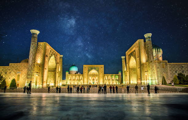 Registan Square in Samarkand at night, Uzbekistan Registan Square in Samarkand at night against Milky Way and stars, Uzbekistan islamic architecture stock pictures, royalty-free photos & images