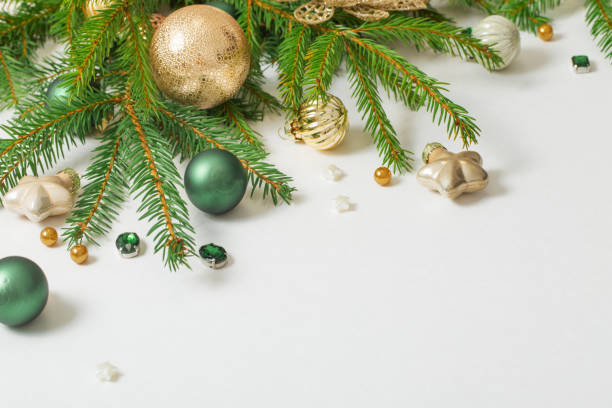 istock golden and green  christmas decorations  on white  background 1441687191