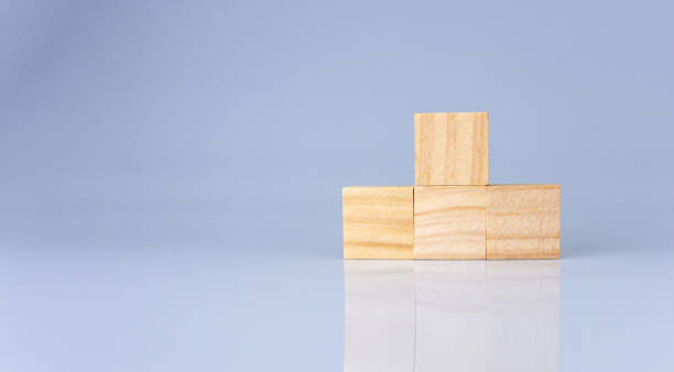 istock empty wooden blocks lined up on a white background. Business concept. 1441687608