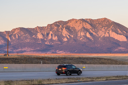 Flatirons near Boulder CO in the sunrise light at winter morning