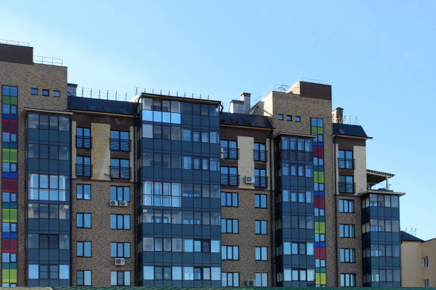 istock A high-rise building stands against the sky on a sunny day. 1441694720