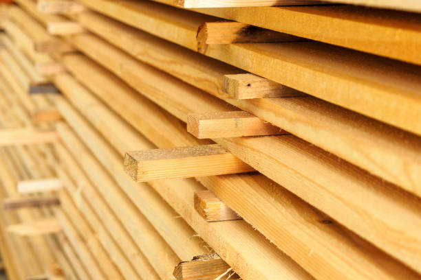 istock Many wooden boards stacked in stack. Building material. Background. Close-up. 1441696151