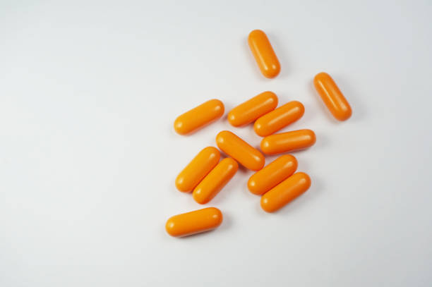 Vitamin C capsules are getting sold like candy. Vitamin C capsules are getting sold like candy. karman stock pictures, royalty-free photos & images