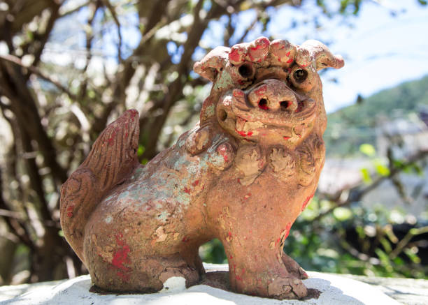Shisa (Lion Statue) on Wall in Okinawa stock photo
