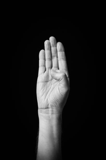 istock Hand demonstrating the Arabic sign language letter 'Kaf' 1441707373