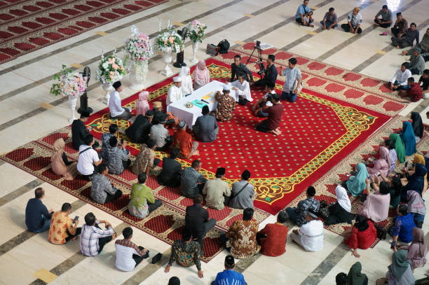 Islamic marriage contract at the Al faruq mosque. Sangatta, East Kalimantan/Indonesia- 08 February 2020. Islamic marriage contract at the Al faruq mosque. An Islamic marriage contract is an Islamic prenuptial agreement. karman stock pictures, royalty-free photos & images