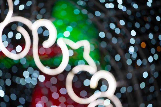 Multi-colored spots of lights from Christmas decorations.