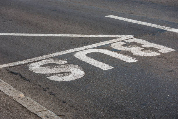istock White bur road mark on asphalt 1441714560