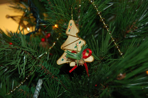 istock Christmas decorations on the green christmas tree. 1441715812