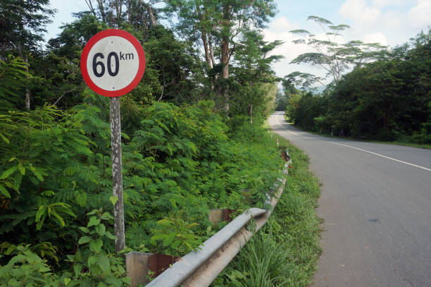 istock Signs on the limited speed highway 60km 1441717222