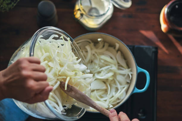 istock Preparing French Onion Bread Bowl in Domestic Kitchen 1441717566