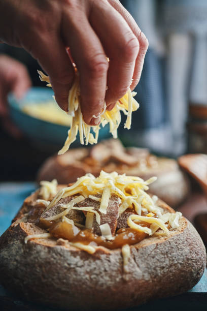 istock Preparing French Onion Bread Bowl in Domestic Kitchen 1441717669