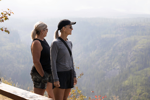 Two woman viewing the Myra Canyon - kettle valley