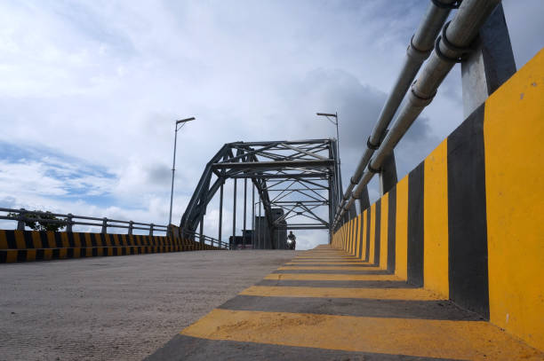 Black and yellow bridge wall stripes location: East Kutai, East Kalimantan, Indonesia karman stock pictures, royalty-free photos & images