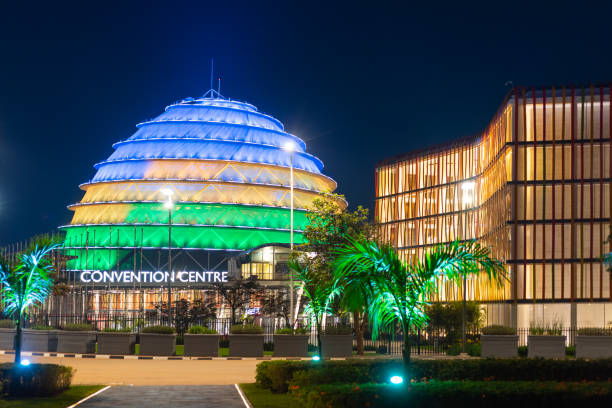 Kigali Convention Centre at night, lit up in the colors of the Rwandan flag Kigali, Rwanda - August 19 2022: Kigali Convention Centre at night, lit up in the colors of the Rwandan flag. The facility is designed to host a variety of events and is a top attraction in the city. rwanda stock pictures, royalty-free photos & images