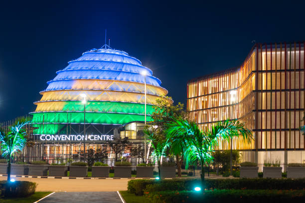 Kigali Convention Centre at night, lit up in the colors of the Rwandan flag Kigali, Rwanda - August 19 2022: Kigali Convention Centre at night, lit up in the colors of the Rwandan flag. The facility is designed to host a variety of events and is a top attraction in the city. kigali convention center stock pictures, royalty-free photos & images