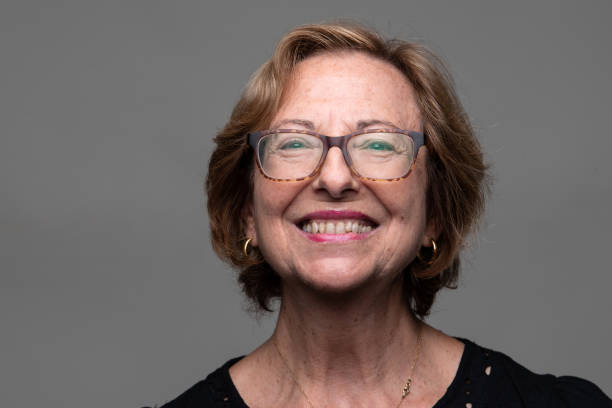 istock Smiling Senior Woman front mugshot 1441721674