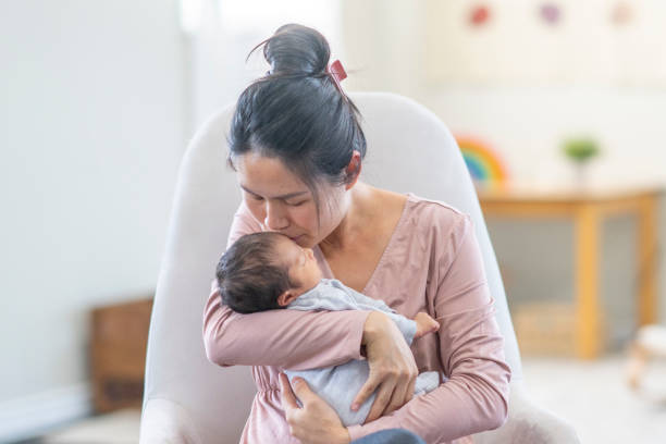 istock New Mother with Her Baby 1441721797