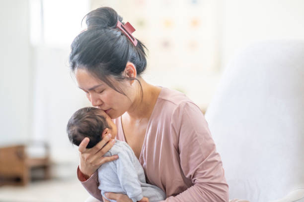 istock New Mother with Her Baby 1441721818