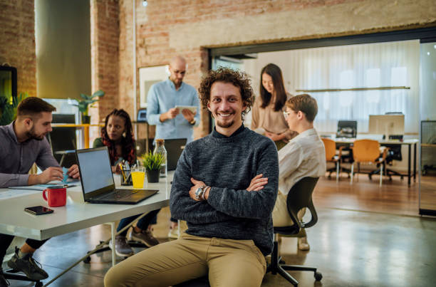 istock Young man in the office 1441721892