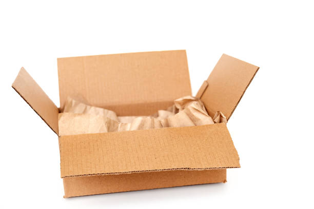 istock Cardboard box with wrapping paper inside isolated on white background, recycling concept 1441722093