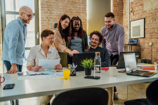 istock Colleagues working together in the office 1441722816