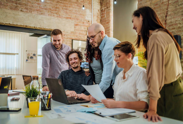 istock Colleagues working together in the office 1441722885