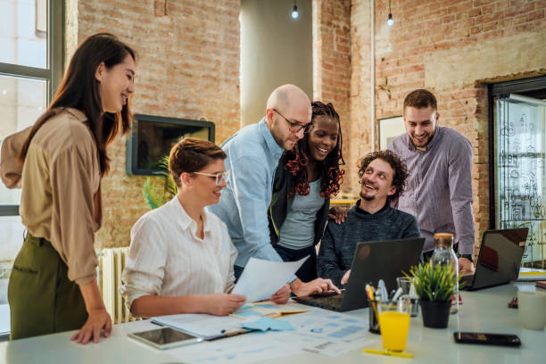 istock Colleagues working together in the office 1441722980