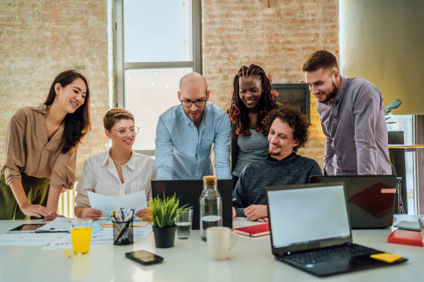 istock Colleagues working together in the office 1441723055