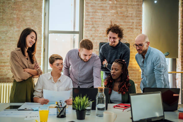 istock Casual business people working together 1441723139