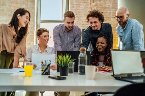 istock Casual business people working together 1441723224
