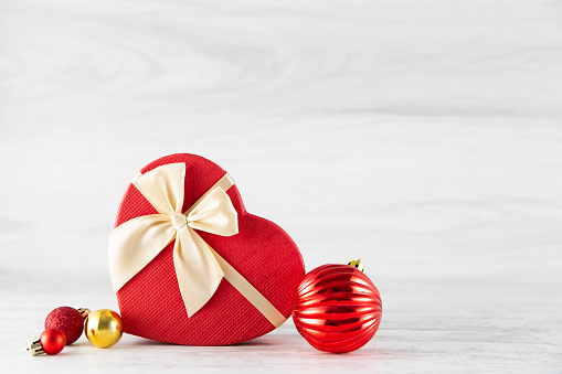 Christmas gift boxes on white wooden background with copy space