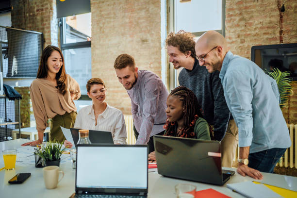 istock Casual business people working together 1441723672