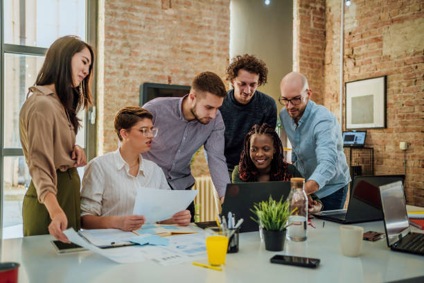 istock Casual business people working together 1441723703