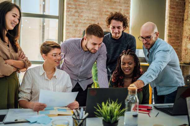 istock Colleagues working together in the office 1441723769