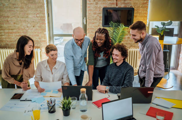 istock Casual business people working together 1441723829