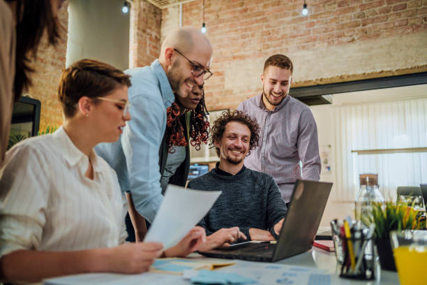 istock Colleagues working together on a new project 1441723874