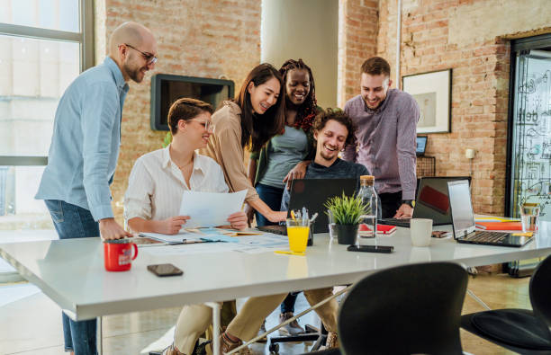 istock Colleagues working together in the office 1441723903