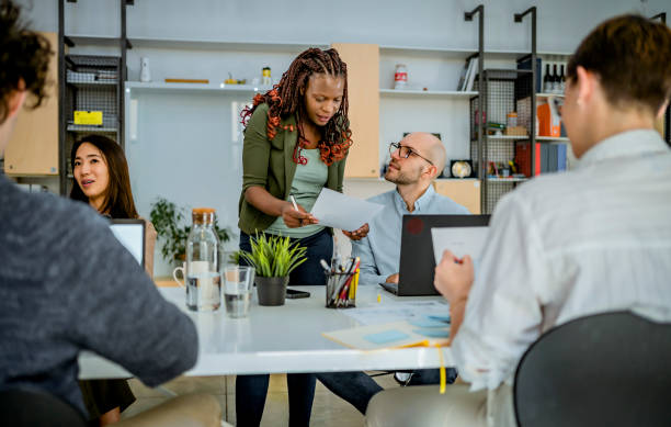 istock Group of young business people 1441724748