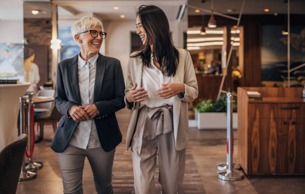 istock Businesswomen in modern cafe 1441725286