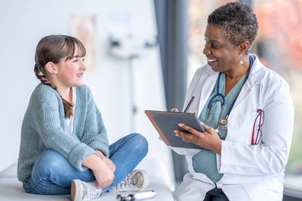 istock Girl at a Medical Check-Up 1441726066