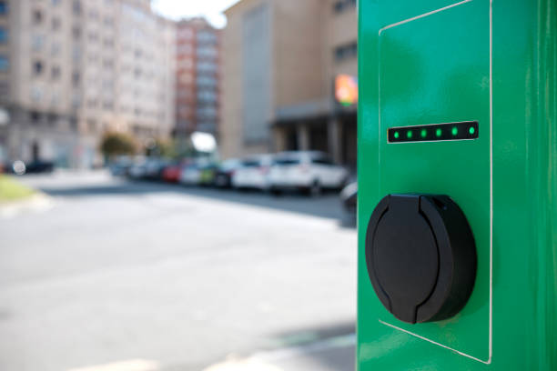 istock Electric car charging station in a sunny day. 1441726247