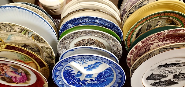 Antique Store Treasures, Williamsburg, Virginia, racks of old fashioned plates