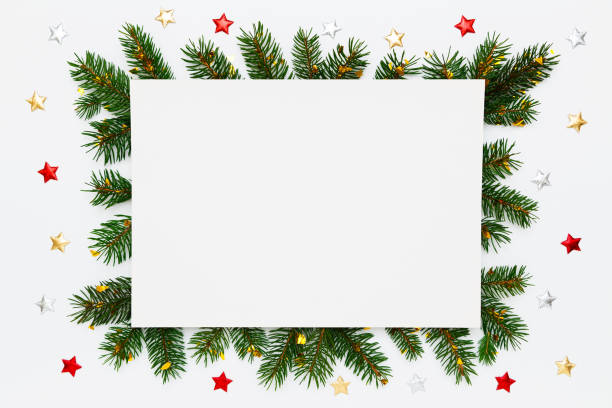 istock Christmas, New Year holiday layout with copy space for text. Blank white paper in frame of natural fir tree branches and decorations on white flat lay background. 1441728984